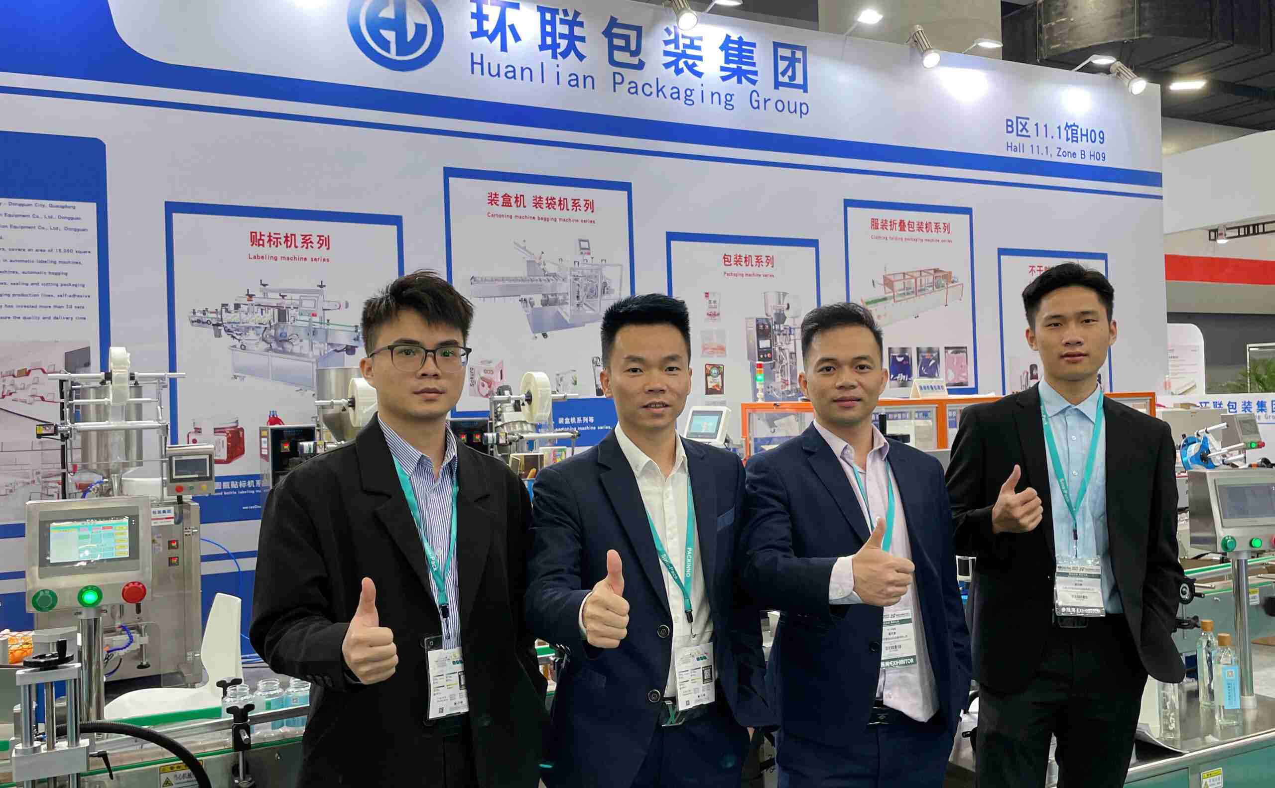 UBL Packaging company team members at a trade show exhibition: Our staff representing UBL to showcase packaging equipment solutions, participating in an industry event to connect with clients and share packaging automation expertise"