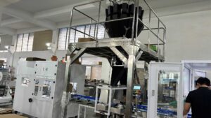 Multi-head weighing packaging system in a factory workshop, a key component of industrial Packaging Automation