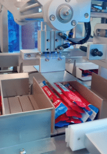 Automatic Cartoning Machine Packaging Chocolate Sachets into Paper Boxes - High-Speed Secondary Packaging Equipment for E-commerce Food Fulfillment