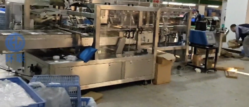 Synchronized Cartoning Line in Industrial Packaging Workshop - Automated Cartoning Machines for Efficient Production
