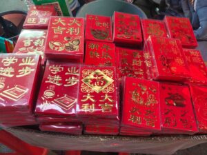 UBL T-type automatic horizontal bagging machine for high-speed red envelope and greeting card packaging.