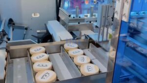UBL intelligent packaging line: automated labeling and cartoning process for manufacturers.