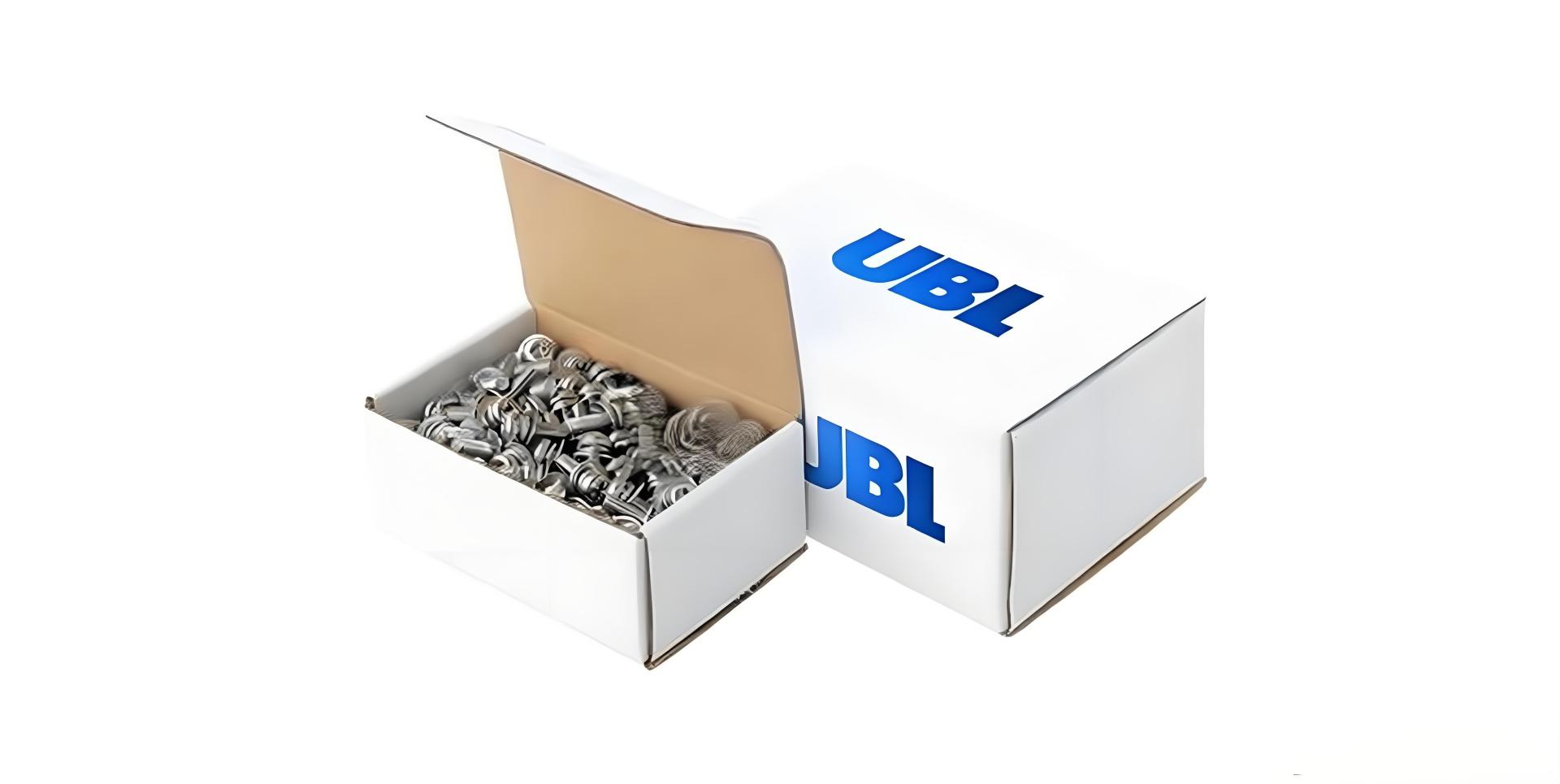 UBL brand metal hardware parts in carton packaging, industrial fasteners and screws for automatic cartoning machine components, compact packaging solution for mechanical assembly parts
