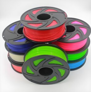 Colorful 3D printer filament spools, ideal for processing with a Spool Vacuum Packaging machine to ensure moisture-proof protection