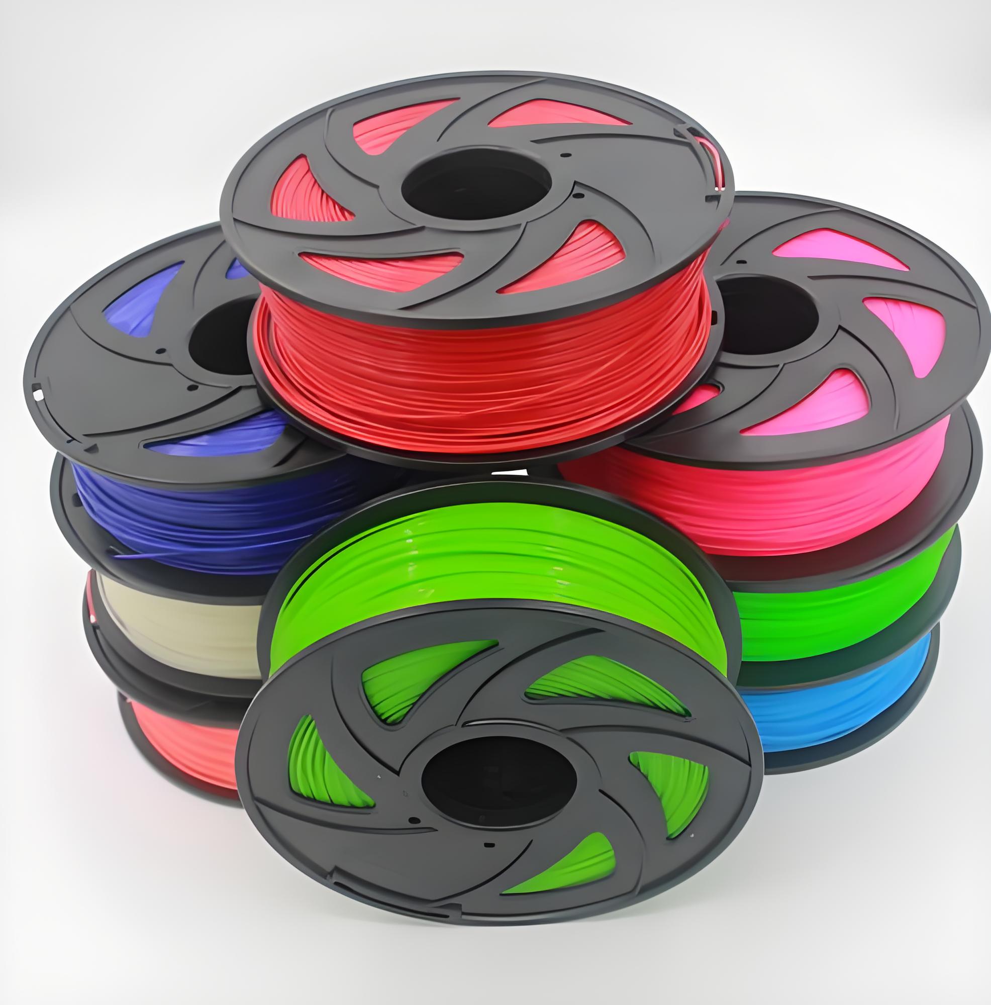 Colorful 3D printer filament spools, ideal for processing with a Spool Vacuum Packaging machine to ensure moisture-proof protection