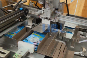 UBL high-speed cartoning machine automatically packaging laundry sheets into boxes, replacing manual labor and boosting production efficiency