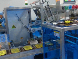 High speed UBL automatic cartoning machine automatically loads durian aluminum tray into paper carton, food packaging production line