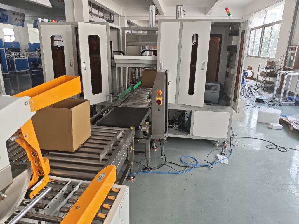 Automatic carton erector with roller conveyor, end-of-line packaging carton opening and conveying equipment, industrial automated packaging production line