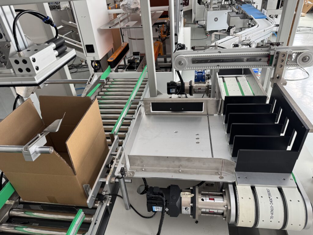Pushing & positioning mechanism of cartoning machine, automatic product loading into cartons, precision component for end-of-line packaging line