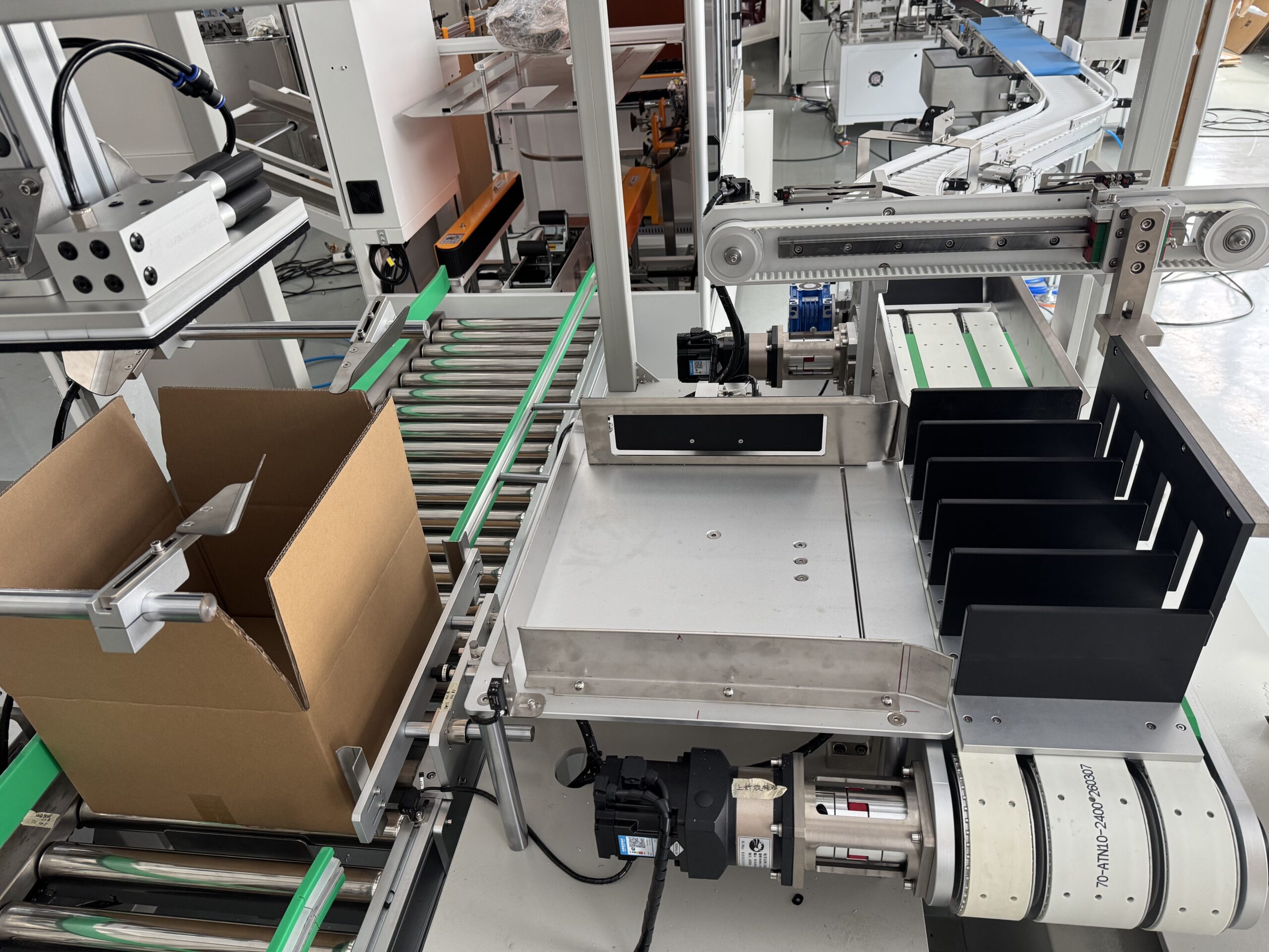 Pushing & positioning mechanism of cartoning machine, automatic product loading into cartons, precision component for end-of-line packaging line